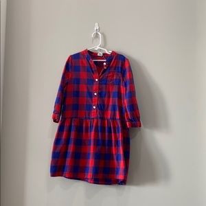 Red purple , blue dress with buttons , a pocket